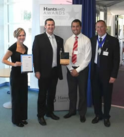 Members of the Isle of Wight Council's Web Team collecting their Hantsweb Award in 2007